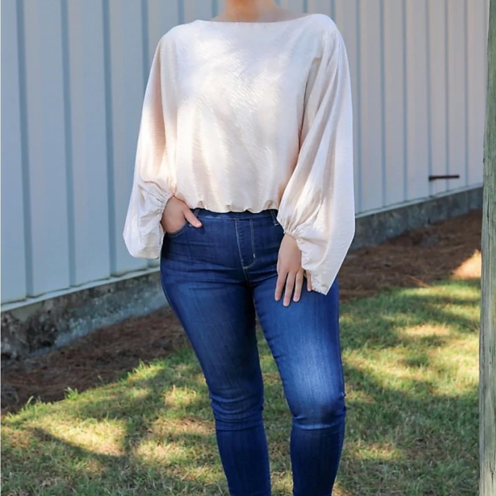 Perfectly Priscilla animal print cream top
